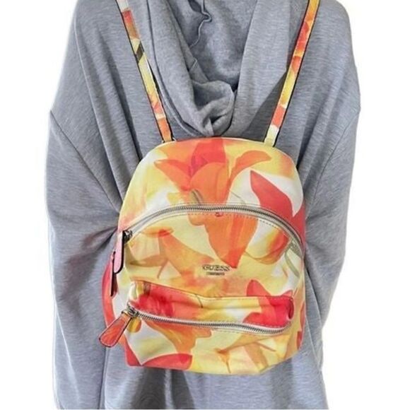 GUESS Women's Take A Dive Floral Backpack
Adjustable backpack straps - Picture 2 of 6